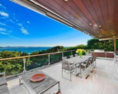 ‘Villa Gabrielle’ graces an address reserved for a privileged few with three architect designed levels embracing sweeping ocean views to Mount Warning. This property has a series of customised living and entertaining spaces and is footsteps to the beach.
Glass doors open to reveal the best views in Byron Bay
Double height foyer has an aquarium and Italian marble floor
Split level dining area and Miele equipped designer kitchen
Lounge features blackbutt floors with a red mahogany border
Tropical gardens reveal a stone water cascade and log gazebo
Black tiled 12m swimming pool with a Japanese stone wall
Double bedrooms pair with deluxe, bespoke feature bathrooms
Master enjoys a level of luxury and a sea view bath ensuite
Vast 734sqm block with lane access and stairs to beach
Near conservation area and minutes to the heart of Byron Bay
