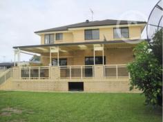 15 Tulloch Street, BLACKTOWN NSW Master Built home by owner builder - massive approximately 42 square home, on 698 square meters of prime position. Site suitable for home professionals: such as Tax Accountants, Medical Practice, Physio Therapists or Home Office for aspiring Business Practice (subject to council approval). WALK-THRU DESCRIPTION: ·         Huge Architect inspired master designed floor plan, open planned fully tiled ground floor lounge/living room or office reception area. ·         Formal dining area through to kitchen paid with granite bench tops, vacuum formed cupboards, walk-in pantry, adapted for ease of access for early rush brekky or nibbling cereal on the granite breakfast bench. ·         Family entertainment area sits 80 people, finally leading to sliding door opening to an extended self contained fully undercover party/entertainment area with it's own external toilet and granite bench/kitchen food preparation area with power outlet for a double door fridge to store your beer and soft drinks. ·         There is also an office or guest room with separate bathroom and super sized laundry area. ·         On the upper floor is a massive masters bedroom (8x4m2 approx) taking up almost a quarter of the top floor, with walk-in-robe, huge en suite with spa so big you can enjoy the warm spa bubbles with the kids. ·         4 Bedrooms in all; the other 3 are double sized bedrooms will fit queen sized beds all with mirror built-in wardrobes and still plenty of space to walk around. ·         Open upper floor TV or leisure room with open large balcony. ·         Extra large main bathroom with shower and bath   Call Benjamin now to book your own guided tour to enjoy and feel this as your new home. Property Features: 4 Bedroom 2 Bathroom 1 Ensuite Formal Lounge Formal Dining Family Room Spa Bath Backyard Alfresco 