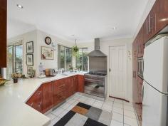  3/35 Webb Street, East Gosford NSW This quality townhouse is positioned on the "Caroline Bay" side of East Gosford opposite the Japanese Gardens/Art Centre and is just a short level walk to shops, cafes, schools and public transport. Immaculately presented and big on size, the home offers 2 spacious living areas downstairs along with a family sized kitchen featuring Caesar-stone and top of the range appliances. Upstairs there are 3 good sized bedrooms with built-in robes whilst the master bedroom has a walk in robe, ensuite and air conditioning. There is a very private north facing courtyard and cottage gardens, ample storage and internal access to the double garage. Situated in a well presented small complex of only 4 townhouses, this property is a must see. 
