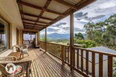 1864 Huon highway, grove tas CALMNESS UNREPEATED FOR SALE - $420,000+ If you are longing for a life of rural calm & a tranquil existence then this beautiful free flowing cottage style house is for you. With magnificent views of the iconic Mountain Sleeping Beauty from your warm and light lounge & dining or through the French doors of your elegant main bedroom room it is hard not to be whisked away to your happy place. There are rare places like this that just make you feel better when you enter them & this home has done that for the owners for 20 years now. The views aren't limited to this Mountain as in the foreground & within the boundaries of the 1.6 acres of well maintained gardens is your very own dam where the ducks happily exist & add to the beauty. Picture yourself sitting on the park bench whilst watching the children exploring with delight & collecting the eggs from your very own chickens. All of this is within an easy 25 minute commute to Hobart. The home has been lovingly restored, maintained & improved to what you see today. The main bedroom has a walk in robe and ensuite with access to a lovely deck through french doors; the 2nd & 3rd bedrooms are double in size with one of these having access to a private paved courtyard. There are 2 living areas to separate the family who can't decide on which channel they wish to view & all the areas have been freshly carpeted. The newly renovated kitchen is spacious & functional with Silas stone bench tops, an impressive & large Belling gas cook top/oven, large walk in pantry, glass splash back, and durable bamboo floating floor. This home has many surprises that have been cleverly added to benefit the function & feel. It has a sunroom currently being used as an art studio at the end of the wrap around undercover deck, surprise!! It has a fully self contained chalet that comes to you furnished & ready for friends, relatives or the teenager who wants to retreat, surprise!! It is heated by a clever wood fired ducted heating system that is kept under the home and is sure to impress the energy conscious & frugal buyer, surprise!! It has a 2 car garage & workshop for the handyman of the family to have their space, surprise!! If that wasn't enough it has a field of Ixia flowers that pop up to reveal a garden of beauty and colour every September, surprise!! There are more fruit trees than I can mention & a large vegetable patch that offers self sufficiency. But it is definitely best that you see this rural delight that is unrepeated to this extreme anywhere else in this area. PROPERTY OVERVIEWProperty ID:3P1647Property Type:HouseLand Size:6084m² approx.Building Size:166m²Garage:2Car Space:4 