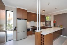  1/217 Coode St , COMO WA Light, modern home in close proximity to the city and CBD. Situated in a great location, this inviting street front townhouse is sure to impress.  A secure entry gate and formal entry lead you into a spacious well maintained home. The open plan kitchen overlooks the dining and family/lounge room both with sliding doors onto the tranquil entertaining area. Stainless steel appliances, Caesar Stone bench tops, breakfast bar add a touch of class to the modern kitchen.  Sliding glass doors allow easy access to a big outdoor undercover pergola with retractable awning � ideal for all year round entertaining. Also on the ground floor, there is a study/4th bedroom, powder room, laundry and direct access from the double garage into the residence.  Upstairs, there is another living area, complimented by a Juliet balcony. The main bedroom is spacious and incorporates an ensuite and large walk in robe. The second and third bedrooms have double built in robes and are serviced by the family bathroom. This is a low maintenance residence you would be proud to own. Be quick to view! KEY SELLING FEATURES � Spacious double size bedrooms � all with robes  � Master with ensuite � double vanity and walk in robes � 2 Living areas � Chef�s kitchen with Caesar Stone bench tops, breakfast bar  � Open plan dining room � Study/4th bedroom � Powder room � Family bathroom � with bath � Reverse cycle air conditioning  � Ducted Vacuum � Double garage with remote controlled door � Direct access into the home from garage � Lovely grassed front yard with secure entry gate � North facing undercover entertaining area with retractable awning and water feature � Security screens to lower level � Security system � Alarm � No common walls � Pets Allowed � Close to state and private schools, shops, transport, river and CBD Rates / Costs Water Rates:$1025.05 p/aCouncil Rates:$2218.25 p/aTotal Fees:$3243.30 p/a 