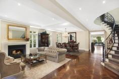  Magnificent European-inspired residence 81 Balfour Road , BELLEVUE HILL Auction Reminiscent of a classically inspired European estate, this impressive residence showcases grand proportions, meticulously selected finishes and a seamless transition between the indoors and the breathtaking alfresco areas. Completed in 2007, it's set on a level 802 sqm parcel of land in one of the East's premier blue ribbon enclaves, just a brief walk to the Rose Bay waterfront. The two-storey home contains five bedrooms and 4.5 bathrooms, including a lavish master suite with a travertine ensuite, custom-designed dressing room and a Juliet balcony. Both the elegant formal lounge and dining room and stately office are warmed by gas fires. Encompassing a sleek CaesarStone Miele kitchen, the casual entertaining space opens to an expansive terrace complete with an in-built barbeque and automated awnings. It overlooks impeccably manicured gardens with sculpted hedges, towering palm trees, a gas-heated heated pool, putting green and a poolside cabana/gym with a WC and fridges. 