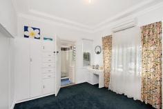  68 Garrick Street, Coolangatta QLD VINTAGE QUEENSLANDER ON 1/4 ACRE Brilliant opportunity to acquire this large Queenslander residence perched high on a superb 1012m2 allotment offering scenic views to the Pacific Ocean heading East.    CONFIGURATION:  - Ideal set up for dual living & or for an extended family - Ground level : living, kitchen / meals area, master bedroom, ensuite & 2 additional bedrooms - Lower level : shower, toilet & laundry - Upper level : living & kitchenette area, bathroom, sunroom & 2 additional bedrooms    KEY FEATURES:  - 5 Bedrooms  - 3 bathrooms - Air-conditioning in living, master and upper level ( 3 split systems ) - Large entertainers rear deck with sun blinds - Front covered patio - Double auto garage - Nicely maintained gardens with plenty of room for additions & pool   DETAILS:  - Land size 1012m2 with a 20m frontage - Unimproved Land Value of $640,000 - Rates TBA - Market rent $500 - $550 per week   LOCATION:  Well positioned within a short walk to Coolangatta CBD offering an abundance of retail & dining options.  For beach lovers and surfers you can choose from Kirra, Coolangatta, Snapper & Rainbow that are all within 500m as the crow flies  The Coolangatta Airport & Southern Cross University are literally (5) minutes from your front door.   AGENTS COMMENTS:  Well loved Queenslander by its proud retired owners for the last 17 years.  This property offers lifestyle choices with development options.   Reluctant sale $745,000   