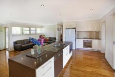  4 Finisterre Avenue, Whalan NSW This renovated beauty is a must to see with features you will love. Simply move in and relax!  Boasting: * Open plan, spacious lounge/dining and kitchen. * Plenty of cupboard space in the renovated galley style kitchen boasting stone bench-tops, Dishwasher, stainless steel appliances, pantry, breakfast bar and more!! * 3 generous size bedrooms with built ins to all rooms. * Main bedroom with new carpet plus ensuite, walk-in robe and air-conditioning. * Updated bathroom tiled to the ceiling with bath and shower. * Outside you can enjoy entertaining on the Huge timber deck with awning. Add to all this the 714m2 block that surrounds the home.  *Side access and covered car accommodation behind lock up gates. Walk to local school, shops and transport, don't miss out on making this renovated house your new home!!   Print Brochure Email Alerts Features  Land Size Approx. - 714 m2  Combustion Fire Place 
