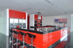 Magnificent is truly an understatement. The epitome of contemporary style and supreme luxury, this superb abode caters for your every need. With over 2,200 square metres of opulent living, the sprawling home is spread over 4 levels. Characterised by floor-to-ceiling glass, superlative black granite tiles, vibrant red features and exquisite furnishings, this mansion is built for living on a grand scale.

Positioned in a premium street in the exclusive Sovereign Islands, this spectacular residence boasts an awesome street presence. On the water side, you will enjoy a protected position in calm water, while looking directly over the Broadwater and out to South Stradbroke Island and Surfers Paradise - a rare and privileged position.

It's features include:

- 60 metres water frontage (approx)
- 18 metre floating pontoon
- 9 metre high entrance foyer with imported chandelier
- 7 massive bedrooms, all ensuited with walk-in robes
- Incredible master suite
- Kids retreat with rumpus lounge, 2 bedrooms and study/storage room
- Separate fully self-contained caretaker's apartment
- 2 executive offices with luxury built-in storage rooms
- Games room with fabulous views
- Media room with built-in bar
- Multiple lounge and dining areas
- Sensational full-size bar
- Stunning temperature-controlled 1500 bottle wine cellar with wine-tasting bar
- Fabulous enormous kitchen with the ultimate in appliances and butler's pantry
- Multiple outdoor entertaining areas
- Full outdoor kitchen and 2 x built-in BBQ's
- Indoor heated pool and separate spa
- Fully equipped gymnasium
- Breathtaking 6000 litre tropical aquarium feature
- Commercial 12-person lift servicing all 4 levels
- Basement garaging for 15 cars
- Manicured gardens
- AMX automation system
- Full concrete construction

Only an inspection can truly reveal the magnificence of this incredible home. Call agent now to arrange your private inspection - confidentiality assured.