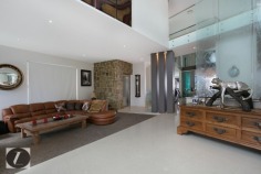 Modern contemporary elegance would best describe this stunning three-level home, perfectly positioned on the waterfront overlooking the wide open canal and out to the Broadwater. From the striking water feature in the entry, through to the incredible kitchen with backlit glass feature, this home provides the very best in indoor and outdoor luxury lifestyle. Whether you are after an impressive bar and entertaining area on the waterfront, or a huge man cave including 12 person spa, this is the house for you!

This home's features include:

-	6 bedrooms
-	5 bathrooms
-	3 powder rooms
-	10 car basement garage
-	North-to-water aspect
-	28 m* waterfrontage
-	Great floor plan with void creating abundance of light and space
-	Stone, marble and water features provide a warm ambience
-	Floor to ceiling glass bi-folds create the ultimate in seamless indoor/outdoor living
-	Sunken formal lounge with gas fireplace
-	Floor to ceiling glass creates spectacular frame for the sensational water views
-	Open plan living areas taking full advantage of the views
-	Fabulous kitchen with backlit glass feature, stone bench tops, wine fridge, Miele appliances including coffee machine
-	Stunning outdoor entertaining area with electronic shutters, stone benches, bar area, cold room, wine fridges, sink and BBQ - and a big screen TV!
-	Another open air entertaining terrace on the waterfront, next to the in ground heated lap pool with plunge pool
-	Tiered theatre with premier home theatre system, a bar and its own powder room
-	Impressive master suite on ground floor with stone feature wall above the vanities, enormous stand-alone bath
-	Master also boasts large walk-in robe with shoe and handbag display areas
-	Upstairs the 2 large waterfront bedrooms are ensuited with superb views
-	There are also 3 bedrooms built especially for the kids with built-in daybeds, which share a bathroom
-	Enviable 'man-cave' in basement, with sliding doors, plenty of room to create the perfect den for your needs
-	Just outside the den area is a 12-person spa
-	Also in basement you will find a dedicated gym room with TV and floor-to-ceiling mirrors, beauty room and bathroom
-	Schindler's lift to all levels
-	Polished timber floors upstairs
-	Floating pontoon with 15m* pontoon
-	Superb position in canal with views out to the open Broadwater
-	Fully fenced with secure gatehouse at front
-	Fully automated C-bus system
-	Reverse cycle ducted air conditioning

Located in a quiet cul-de-sac in a prestigious street surrounded by other waterfront mansions, you are in good company! The Sovereign Islands is a unique island community providing 24 hour security with patrols. Private, luxurious and secure, yet so close the cafes, restaurants, shops and parklands of Paradise Point.

Call Shaun today to arrange your private inspection.