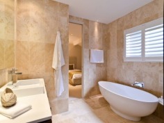 This prestigious estate is situated at the end of the highly respected Maryland Avenue. Situated in privacy behind grand electric gates and sand stone walls are two prime acres on two titles.

The architect has designed this home to maximize its North facing position with views to the East as well. This park like setting with mature trees is elevated 1.7 meters above adjoining land and has not been affected by major floods. This recently refurbished residence offers 1,000 square meters of opulent decor with the latest sinks, tubs and tap ware. Separate from the main house and situated near the entry gates is 2 bedroom guest house with its own complete kitchen, laundry, lounge and study. A large pontoon and wharf beside the river gives access to the Broadwater and out to the ocean from your back yard.

Features of this property:

7 Bedrooms, 6 bathrooms, 5 car garage with parking for upto 10 vehicles
Master bedroom includes parents retreat, twin dressing room, riverside balcony, and deluxe ensuite
Designer chefs kitchen with granite bench tops, 2 oven plus warming ovens, and walk in pantry
A Helipad has been approved for this estate.
Championship tennis court with flood lights and pavilion with kitchen, bath and shower.
10 meter pontoon, jet ski cradle, power and water supply
Infar-red security cameras with back to base alarms
Automatic emergency power generator
fully automated irrigation
Future sub- division potential - subject to council approval
Formal living area with open fireplace
Wine cellar
indoor/outdoor entertaining
In-ground swimming pool
in home theatre with elevated seating and soundproof walls
Games room
sizable laundry
Ducted air-conditioning
Landscaped gardens with mature trees and lush lawns, Horses are permitted on the property
Sweeping 200 degree river and skyline views
Less than 5 minutes drive to Royal Pines Golf Resort, Emerald lakes golf, Lakelands golf
8 min drive to Major Shopping Centres, Schools and Central Business district
This property is currently on two titles with an option to purchase the main house and guest house on 1 acre, or purchase 1 acre of riverfront land for offers over $2 million