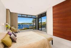  DOLANS BAY NSW 742 Port Hacking Road A truly unique prospect for first class family living, this landmark residence is set over a 2,950sqm north facing waterfront parcel embracing spectacular bay views. It magnificently fuses period charm with contemporary style and unrivalled facilities. Restored sandstone home formerly Sisters of Mercy Convent Stunning architecturally designed contemporary wing addition Palatial interiors customised with globally sourced materials Living areas utilise glass and outdoor flow to maximise views State-of-the-art CaesarStone kitchen with Miele appliances Ten person home theatre room, entertainers’ kitchen and bar 22m heated indoor pool, gym, sauna and steam room facilities 26m waterside pool set amid terraced manicured gardens All boating facilities including boatshed, sliprails, jetty Just minutes to village shops, proximate to beach, airport 