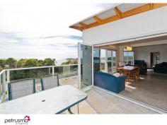 2 Caribbean Court, Eaglehawk Neck TAS Immediately striking from the street frontage, and enjoying the simply intoxicating views over Pirates Bay, this stylish residence is a step above in every respect. Thoughtful design, sleek interiors and true function.  Wonderfully located in this picturesque setting, this inviting property would suit full time residents or purchasers requiring an upmarket beach house to escape and enjoy all this brilliant area has to offer, being so close the local attractions and pristine beaches for which this area is renowned. Surrounded by easily maintained landscaped gardens, the lower level comprises two double bedrooms, additional living space and up to the minute modern bathroom.  Upstairs, striking polished concrete floors, extensive of glass and generous proportions have created a breathtaking living space maximising the views and allowing access the full length terrace, plus incorporating a beautiful kitchen with top quality fittings. The master suite is a feature in itself with enormous concealed walk through wardrobe and luxurious ensuite bathroom. Vehicle access is either at the front into the garage, or at the rear for backyard access and the double boat / carport. Beautiful finishes, neutral colour pallette and a simply wonderful setting culminate to create a very special property indeed.  - Generous light filled living areas  - A simply picturesque location  - Built and finished with true detail  - Living opening to terrace  - A residence of style and panache 