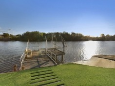 RARE MAIN RIVER ESTATE - An Entertainers Paradise
For the past 18 years has been home to one of Australia's most successful sportsmen.

The main home is Ranch style with 5 large bedrooms, 5 bathrooms, study, gourmet kitchen, large living rooms and double garage. Additional to this, there is a separate guest area including kitchen, lounge, bathroom, large office, work room and 3rd garage.

Bring your friends to the unique freestanding fully equipped sports bar to watch sport with beer on tap. The pool area has its own Bali Hut with full kitchen including Pizza Oven. At your own jetty enjoy the undercover BBQ area. 

This truly amazing property has all the benefits of a resort in your own backyard only 10 minutes to the beach and all the best the Gold Coast has to offer. 

A private estate on Main River where properties rarely become available this estate has everything an entertainer could want.

Countless more features for the discerning buyer of this property to enjoy! This sensational property has to be seen to be believed. Don't miss this opportunity.
View Sold Properties for this Location
View Auction Results
General Features
Property Type:House
Bedrooms:5
Bathrooms:5
Indoor Features
Ensuite:4
Ducted Heating
Ducted Cooling
Air Conditioning