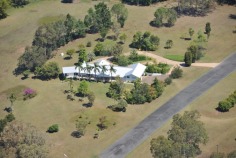 Bimbadeen means place of waterbirds - a waterfront acres sanctuary with 300 degree lake views, fishing, boating, sailing, flying??? Frontage to beautiful Lake Macdonald overlooking Noosa's botanical gardens. Private driveway is boarded by water on either side, with exotic wildlife and magnificent views to Mt Cooroy & Tinbeerwah. The perfect combination of being only 5 minutes from Cooroy and 15 minutes to Noosa, with town water, sewer and peace and tranquility. Sprawling brick residence with raked ceilings, french oak floors, gourmet kitchen, gas & induction cooking and ducted air conditioning. Solid timber doors & windows throughout. 3 separate living areas, wide entertaining patios, 4 car garage and boat store/cellar under the home.
500m Bitumen airstrip, fully insulated 2 plane hangar with workshop, separate machinery shed and van port.
Stroll the park like acreage on this resort style sanctuary tailored for relaxation. Host a tennis party on your own flood lit tennis court. This property is your opportunity to live the dream, own or operate an aircraft, also ideal for car or boat enthusiast with 2 large quality sheds and 3 phase power.18.29 acres/7.4 hectares. For further details or inspection please contact our office. rh06506

Bimbadeen - 18.29 acressealed airstrip2km Lake Frontplane hangar and shedstotally private