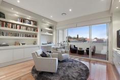HAMPTON 28 Beach Road
EmailFacebookTwitterGoogle +Print this pageAdd to Favourite/BookmarkShare this site
Private Sale Contact Agent
4 B 3 b 4 C Watch property video
Unparalleled Resort Style Living on the Bay!
Enjoy a luxury beachside lifestyle with show-stopping bay views and timeless Jon Friedrich design with a focus on exceptional indoor/outdoor entertaining. Inspired by Noosa's Seahaven Resort this prestigious 3 bedroom, 3.5 bathroom residence boasts spectacular uninterrupted views stretching from Sandringham Yacht Club to Green point & beyond combined with sparkling internal pool views downstairs. Immaculately presented for family enjoyment featuring grand proportions and three flexible living zones including a ground floor kids haven or guest quarters with two double bedrooms both with mirrored robes & sleek granite vanity ensuites and a fully fitted study that provides a fourth bedroom option. Choose a dip in the Bay via direct access to one of Melbourne's best beaches or luxuriate by the tranquil indoor resort style lap pool encased in huge glass windows with sliding doors to a vast family lounge & bar on one side and a landscaped, paved outdoor area on the other. Panoramic views dominate the upstairs open plan living & dining area with an epicurean kitchen (granite bench tops & walk in pantry) and a sublime full-length outdoor terrace perfect for sunset entertaining. An elegant parents lounge with study alcove & a rear sun soaked deck (built in BBQ) precedes a lavish master suite with 'his & hers' dressing room and a grand Travertine spa ensuite. Meticulous attention to detail, superior finishes and luxury extras such as custom cabinetry throughout, a poolside shower, zoned heating/A/C, ducted vacuuming, alarm and a unique circular driveway with two internal access double garages (4 cars) only moments to Hampton Street shopping, dining & the station complete this idyllic family residence. For more information about this unsurpassed lifestyle property please contact Andrew Campbell.