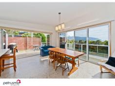 2 Caribbean Court, Eaglehawk Neck TAS Immediately striking from the street frontage, and enjoying the simply intoxicating views over Pirates Bay, this stylish residence is a step above in every respect. Thoughtful design, sleek interiors and true function.  Wonderfully located in this picturesque setting, this inviting property would suit full time residents or purchasers requiring an upmarket beach house to escape and enjoy all this brilliant area has to offer, being so close the local attractions and pristine beaches for which this area is renowned. Surrounded by easily maintained landscaped gardens, the lower level comprises two double bedrooms, additional living space and up to the minute modern bathroom.  Upstairs, striking polished concrete floors, extensive of glass and generous proportions have created a breathtaking living space maximising the views and allowing access the full length terrace, plus incorporating a beautiful kitchen with top quality fittings. The master suite is a feature in itself with enormous concealed walk through wardrobe and luxurious ensuite bathroom. Vehicle access is either at the front into the garage, or at the rear for backyard access and the double boat / carport. Beautiful finishes, neutral colour pallette and a simply wonderful setting culminate to create a very special property indeed.  - Generous light filled living areas  - A simply picturesque location  - Built and finished with true detail  - Living opening to terrace  - A residence of style and panache 