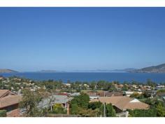  55 Maluka Terrace, Bellerive TAS This inviting home of grand proportions occupies a premier position in a quiet cul-de-sac, with a feeling of total privacy and enjoying beautiful panoramic river views. The spacious and intelligently designed home features a formal entrance hall, ?showpiece? timber staircase, bay windows, large balcony, patio entertainment area and high ceilings throughout. A well appointed kitchen and open plan dining area leads to the balcony. Three living areas are ideal for a large or extended family and the views will inspire and captivate by night and by day! There are four good sized bedrooms all with built-ins (master bedroom includes walk-in robe and ensuite); a tiled main bathroom with separate toilet, separate laundry and a powder room (toilet and vanity) on the lower level. There?s a remote double garage with internal access, a workshop area, huge storage options and a neat wine cellar! Bellerive is a highly ?sought after? location on Hobart?s Eastern shore with easy access to parklands, beaches, schools, shops, services, sporting grounds, public transport all less than 10 minutes to Hobart?s city centre. * If you are looking to purchase around this range we recommend an inspection. This is not the selling price but a Buyer Inquiry Range. 
