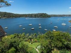  EXTRAORDINARY OPPORTUNITY - PRIZED WATERFRONT POSITION HUGE 2386 SQUARE METRE BLOCK - SET ON TWO TITLES 304-306 Edinburgh Road, Castlecrag, NSW 2068 From its coveted position on prestigious Sugarloaf Point this elegant, generously proportioned family residence enjoys 270 degree views over Middle Harbour and is just fifteen minutes from the CBD. Cleverly designed to harmoniously connect with the natural environment, the home features spacious informal living areas with stunning water views from almost every room. The block size is enormous incorporating 304 Edinburgh Road at 1,208 sqm & 306 Edinburgh Road at 1,178 sqm. * Seven spacious bedrooms  * Five bathrooms plus two guest powder rooms  * Generous eat-in kitchen  * Pool beneath transparent conservatory & poolside cabana  * Two bedroom guest wing upstairs  * Wine cellar for 2000 bottles  * Triple car garage plus off-street parking  * Waterfront boat shed  * State-of-the-art security  * Commercial grade air-conditioning  * Inclinator to waterfront  * Landscaped gardens, terraced lawns & fish pond Inspect: By Appointment  For Sale: By Expressions of Interest  Details: Paul Rich 0412 754 122 