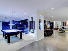 Sprawling Family Estate
Privately tucked away on a sensational block, this massive family home has everything a modern family needs and more. Open plan living and free flowing light filled spaces present the ideal design for everyday living. This whisper quiet location with views brings a whole new meaning to privacy.

At the very heart of the home is the chefs kitchen with Gaggenau appliances including self-cleaning oven, steam oven and coffee machine, stone bench tops, butler's pantry with sink and 2 fridges, plenty of storage and a breakfast bar that flows seamlessly through to the dining and living areas. Leading out through bi fold doors from main living space is the expansive outdoor entertainment area, highlighting 2 fridges and a sink, perfect for every season, taking in the spectacular view over the resort style, negative edge solar heated pool, spa and Balinese inspired setting and swim up bar.

The home holds five bedrooms, all include built in robes and the main bedroom includes a luxury ensuite, walk-in robe and private balcony overlooking the entire grounds. All bedrooms enjoy the views of the estate and its leafy surrounds. A well-appointed main bathroom also services the bedrooms on the upper level.

The entire home is air conditioned throughout and incorporates an intercom system for added security. The family has catered for the kids with a play area featuring bubbles and squirts. Outside the grounds are complete with chicken coop, dog area with gate enclosures and a citrus garden. With 9 car under cover accommodation and another three bay shed, incorporating high boat/caravan port, this private family home is ready for you to simply move in and enjoy.

This captivating residence is just moments from Westfield Carindale, close to local shops, elite schools, and enjoys easy access to main arterial roads. Relax and take in the views at your new Place.