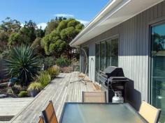 23 Calverton Place, South Arm TAS Sun gathering special Situated in a cul-de-sac position, in a new house area at the friendly seaside town of South Arm, renown for its community lifestyle and amidst the beautiful environment of beaches and walking trails with some of the oldest history in Australia to visit and admire. This sun gathering modern home is ideally placed with mountain views and a level land area of 1847m2. Parking is easy as besides a carport and double garage, there is ample space for the boat or campervans etc. A close and easy walk to the pharmacy, coffee shop, licensed restaurant, hair salon, hobby shop, newsagency post office and general store, RSL golf course/tavern complex and the Metro bus service to Hobart. This property has 2 large bedrooms on the ground level, one with a walk-in-robe and direct access to the bathroom, a separate toilet and laundry. If you are worried about the stairs to the 3rd bedroom with an en-suite, just keep that one for your visitors retreat, however if you wish, it is a beautiful master bedroom.  Under the stairs is a lovely study computer area. The living room is fantastic, running the full length of the house with access out onto the large sundeck. The kitchen with its breakfast island bench is central with a woodheater ideally positioned. A rear sundeck is terrific for those leisurely morning breakfasts, plus the property has delightful gardens, fruit trees and raised garden vegetable beds with a storage shed close by. A very well presented and cared for home in a great position. 