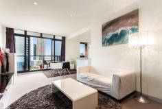 Private Sale
211
Modern Luxury, Mesmerising Views
Open, modern & spacious, this sleek apartment makes the most of its elevated position in the block by capturing sensational ever-changing panoramas of the city by day & a sparkling sea of lights by night. With a stone-topped kitchen neatly tucked away on the side, living/dining flows onto covered balcony - perfect for chillaxing at the end of the day as the city lights begin to shine. Extras include a European laundry in the bathroom, built-robes in the two bedrooms, video-monitored intercom entry & security card swipe access in the elevators. Residents also get to enjoy the use of a gym, indoor pool, business centre & concierge. This is the ultimate lifestyle literally on the city's edge just a walk away from the CBD, Crown Entertainment Complex, the Yarra River, Clarendon Street's shopping strip & transport networks. Currently leased at $2,564 pcm.
Price Guide$500,000 - $560,000
ContactAdd to address book Leon Gouzenfiter 0422 339 791 Email View profile
Add to address book Ben Ajzner 0421 706 836 Email View profile