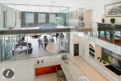 Modern contemporary elegance would best describe this stunning three-level home, perfectly positioned on the waterfront overlooking the wide open canal and out to the Broadwater. From the striking water feature in the entry, through to the incredible kitchen with backlit glass feature, this home provides the very best in indoor and outdoor luxury lifestyle. Whether you are after an impressive bar and entertaining area on the waterfront, or a huge man cave including 12 person spa, this is the house for you!

This home's features include:

-	6 bedrooms
-	5 bathrooms
-	3 powder rooms
-	10 car basement garage
-	North-to-water aspect
-	28 m* waterfrontage
-	Great floor plan with void creating abundance of light and space
-	Stone, marble and water features provide a warm ambience
-	Floor to ceiling glass bi-folds create the ultimate in seamless indoor/outdoor living
-	Sunken formal lounge with gas fireplace
-	Floor to ceiling glass creates spectacular frame for the sensational water views
-	Open plan living areas taking full advantage of the views
-	Fabulous kitchen with backlit glass feature, stone bench tops, wine fridge, Miele appliances including coffee machine
-	Stunning outdoor entertaining area with electronic shutters, stone benches, bar area, cold room, wine fridges, sink and BBQ - and a big screen TV!
-	Another open air entertaining terrace on the waterfront, next to the in ground heated lap pool with plunge pool
-	Tiered theatre with premier home theatre system, a bar and its own powder room
-	Impressive master suite on ground floor with stone feature wall above the vanities, enormous stand-alone bath
-	Master also boasts large walk-in robe with shoe and handbag display areas
-	Upstairs the 2 large waterfront bedrooms are ensuited with superb views
-	There are also 3 bedrooms built especially for the kids with built-in daybeds, which share a bathroom
-	Enviable 'man-cave' in basement, with sliding doors, plenty of room to create the perfect den for your needs
-	Just outside the den area is a 12-person spa
-	Also in basement you will find a dedicated gym room with TV and floor-to-ceiling mirrors, beauty room and bathroom
-	Schindler's lift to all levels
-	Polished timber floors upstairs
-	Floating pontoon with 15m* pontoon
-	Superb position in canal with views out to the open Broadwater
-	Fully fenced with secure gatehouse at front
-	Fully automated C-bus system
-	Reverse cycle ducted air conditioning

Located in a quiet cul-de-sac in a prestigious street surrounded by other waterfront mansions, you are in good company! The Sovereign Islands is a unique island community providing 24 hour security with patrols. Private, luxurious and secure, yet so close the cafes, restaurants, shops and parklands of Paradise Point.

Call Shaun today to arrange your private inspection.