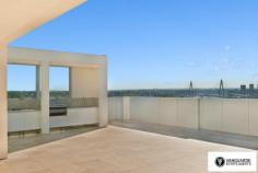 Unit 1501/507 Wattle Street,  Sydney NSW For Sale - $3,300,000  3  4  4 For the first time offered since completion, Vanguarde is happy to present to you this spectacular brand new three bedroom penthouse, which is ideal for the modern family or foreign purchaser. Commanding the top 2 levels, this impressive residence offers a huge roof top terrace with uninterrupted 180 degree north, views of Sydney. Spanning from the west right around to the east, this aspect incorporates stunning city skyline and Anzac Bridge views. Accommodation comprises of 3 generous bedrooms, all with full ensuites including spa bath, and built in robes. This residence offers a total of 545sqm on title. The huge rooftop terrace includes a full outdoor kitchen with BBQ plus a complete guest bathroom. With direct lift access from the ground, making it perfect for entertaining guests! Features include only the highest quality finishes throughout, including marble stone and Australian hardwood timber flooring, LED lights and double glazed floor to ceiling glass, allowing you to take in the expansive views. The designer kitchen comes complete with White Caesar stone bench tops, stainless steel Smeg appliances including built in coffee machine and plate warmer, soft close drawers and a built in double door fridge. The residence provides ducted reverse cycle air-conditioning, spacious 4 car lock up garage with direct lift access plus extra storage, an internal laundry and a self controlled video security system.  With the lowest strata levies in Sydney for a property of this size, and the possibility to extend space and add value, the opportunities in purchasing this property are endless.  This is truly a unique property and is must see for anyone looking at purchasing their perfect city home! Quarterly Rates Strata: $805 per quarter approx Water: $168 per quarter approx Council: $225 per quarter approx For more information contact Travis Reeve on 0414 347 713 or travis@vanguarde.com.au or Darren Smith on 0412 418 415 