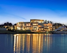 'Sails' is a significant offering of architectural brilliance and grandeur spanning three levels. Distinctly world class, positioned on 5,371sqm with a rare 176 metre wide water frontage, it is set in the prestigious Hope Island Resort.
Approximately 2,709sqm all-occasion living and entertaining
5,371sqm of north facing riverfront land, with private pontoon
Eclectic mix of classic styling and contemporary chic
Swarovski Crystal chandeliers, breathtaking views to the river
Two grand master suites, one encompassing entire upper wing
Five master sized bedrooms with ensuites and walk-in-robes
Superb commercial grade kitchen, office wing with boardroom
Library with fireplace, bar, cinema and a billiards room
Lagoon style pool, wet bar, indoor spa, sauna, barbecue area
Lift, garage for 8 cars, C-Bus, 24 hour security, F.I.R.B approved