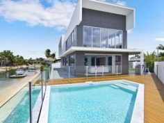 Large Family Home or Holiday Letters Dream!
This property has been architecturally designed with a beautiful outlook from the street and looking in from the water. This house has been solely built to be in a holiday letting pool and is currently forward booked for the next 11 months! 

The house offers a new level of contemporary design and living. It has an amazing open plan kitchen which includes a bar fridge and a butlers pantry. It boasts a massive living area that has views of the pool, canal and Broadbeach. This house is ideal for large groups and families with its 5 huge bedrooms and 4 bathrooms.The master bedroom has stunning views of Broadbeach and the waterways. Each bathroom presents elegance and design and you won't be disappointed.

Returning approximately $100,000+ per year!



This apartment is consistently booked and can be inspected between bookings only. Please contact Matt Conduit or Trent Macartney to organise your inspection.
 
Property Snapshot 

Property Type:HouseAspect Views:South East