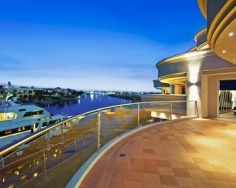 'Sails' is a significant offering of architectural brilliance and grandeur spanning three levels. Distinctly world class, positioned on 5,371sqm with a rare 176 metre wide water frontage, it is set in the prestigious Hope Island Resort.
Approximately 2,709sqm all-occasion living and entertaining
5,371sqm of north facing riverfront land, with private pontoon
Eclectic mix of classic styling and contemporary chic
Swarovski Crystal chandeliers, breathtaking views to the river
Two grand master suites, one encompassing entire upper wing
Five master sized bedrooms with ensuites and walk-in-robes
Superb commercial grade kitchen, office wing with boardroom
Library with fireplace, bar, cinema and a billiards room
Lagoon style pool, wet bar, indoor spa, sauna, barbecue area
Lift, garage for 8 cars, C-Bus, 24 hour security, F.I.R.B approved