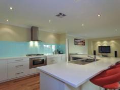  6 BAFILE LANE BEELIAR WA From $609,000 ANOTHER "UNDER OFFER" BY BRENDAN TADDEO "UNDER OFFER"  Situated on an elevated 559sqm block (appx) with a HUGE 19.3m frontage this superbly presented home has it all. This property comprises of 4 bedrooms 2 bathrooms, separate home office and separate home theatre and has many upgraded features making this home a sort after piece of real estate.  Featuring 4 double sized bedrooms, 2 luxurious bathrooms, spectacular open plan living areas and sensational outdoor entertaining area makes this home perfect for the growing family or entertainer. Built to impress all the electrical work has been upgraded to feature down lighting and dimmer switches. A chef’s gourmet kitchen positioned at the heart of the design with 900mm stainless steel appliances and glass splash backs with soft closers to all drawers and doors. Premium wood flooring throughout and heavy duty quality carpets, a double sized master suite walk in robe that has been custom designed to accommodate every woman’s needs, side access for the caravan or trailer and a large alfresco under the main roof with quality timber decking off the family and meals room.  Situated amongst quality built homes and within a short stroll to local parks and minutes from Coogee beach and Fremantle makes this home all the more attractive and a great investment.  More FeatureBathrooms2Bedrooms4DiningFamilyGas ConnectedGas PassesInsulationKitchenLoungeOutdoor EntertainingSewer ConnectedSewer PassesStoreys1StudyWater Closets2 For more information or an onsite inspection call Brendan Taddeo today! Contact Agent Brendan Taddeo M: 0400 021 927 SEND EMAIL 