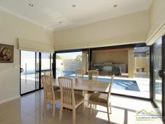  6 Lautoka Rise, Mindarie WA Beaumonde homes have been built on reputation since 1986 and this stunning 2008 built home is a classic example of the style, quality of craftsmanship and attention to detail that Beaumonde demand.  The owners of this gorgeous home insisted on important facets of the build to ensure their home exuded sophistication and quality like 38 and 37 course ceilings, imported Italian porcelain tiles, pewter granite, Eastern Blackbutt flooring from Grandwood floors and Daiken Reverse Cycle Ducted Air conditioning.  Not only is this home a stunning/quality built property but it is located in a very desirable position only minutes walk to the Mindarie Marina, Claytons beach the schools and shops. Gorgeous ocean views greet you as soon as you walk upstairs with the bright blue sparkle of the pool below.  This home is faultless, see the list of features below:  Level One:  Inviting generous decked porch area with double door entry  Classic beautiful lobby bringing you into the formal lounge  Formal Lounge the perfect place to great your guests  Double Doors lead to the open Family/Dining/Kitchen-the most important and most used area of the home with recess area to family room for the TV, a bank of glass surrounding the dining area.  Huge kitchen with Pewter granite bench tops that have shark nosed edging, massive walk in pantry, central island work area giving you uninterrupted views of the swimming pool, quality under bench oven and gas hot plate with overhead stainless steel and glass range hood. Appliance cupboard and good sized fridge recess plus plenty of preparation area  Leading from the hub of the home you enter the purpose built Theatre Room with dual access to the outdoors so can be a multi-purpose room great as a big play room when the children are small  Three very generous children?s bedrooms all with double robes and of course those 38 course ceilings  Main Bathroom has a separate WC with powder room which then leads to the main shower and the oval bath  Walk in Linen giving plenty of storage  Well equipped laundry Level Two:  Beautiful elegant staircase leading to the top level  Huge open space consisting of the Study and the upstairs Lounge  Kitchenette/Bar upstairs with glass splashback, fridge, microwave and sink  Massive balcony with beautiful ocean views  Main Bedroom Suite with private balcony thru double doors  Massive walk in robe  Amazing En suite with double basin vanity, huge oval spa bath, generous shower and separate WC Extras you will enjoy:  Outdoor Cabana with decking and timber lined ceiling that overlooks the pool  Stand Alone bricked Shed ? ideal to convert into shower block  Ducted Reverse Cycle Air conditioning  Solid timber flooring and Italian porcelain tiling  Warm timber double front doors  Storage under the Stairs  Huge double garage with sectional remote door  Quality light fittings and down lights  Wrap around below ground swimming pool with water feature  Extensive limestone paving surrounding the home  Grassed area for the kids to play  Side access thru timber gates  Completed in 2008  Approximate size of home in total 380sqm  Block size 612sqm 