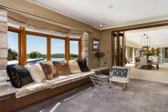 54 Lane Cove Road,  Ingleside NSW For Sale - Offers Over $8,500,000  8  9  6 Unequivocally one of Sydney's finest estates, this magnificent 5 acre holding has left nothing undone its quest for luxurious liveability. From its spectacular gala indoor/outdoor entertaining venues including a tennis court, 26 metre heated pool, indoor jumps arena and state-of-the-art stables, it exceeds the expectations of the most discerning elitist on every front. Nestled on private rolling lawns with sweeping 180 degree north easterly ocean and coastal vistas, it is only 30 minutes from the CBD and moments to village shops, schools and beaches. Drive through the secure gated entry and wind your way past the timber post, rail paddocks and cascading waterfall to the residence. From the moment you lay eyes on the exquisitely crafted facade it becomes immediately apparent that this residence is of the highest calibre. Exquisitely crafted from sandstone and wrapped in a timber posted bull-nose verandah with a large turret romancing the facade, it tastefully fuses Australian colonial and European provincial themes with designer finishes to create a retreat of elegance and sophistication with a warm country-style ambiance. Guests are welcomed through the grand formal entrance foyer with soaring double height ceilings with an elaborate antique chandelier lighting the way. The living spaces have been cleverly interwoven to integrate with an enormous indoor/outdoor loggia with an open fireplace. Separate living and dining areas merges seamlessly with level lawns and soaks in the north easterly sun, summer breezes and sweeping views. It comes complete with formal living and dining spaces plus an enormous family room or home cinema with surround sound and mounted flat screen TV.  Finished in imported Italian marble with a breakfast bar and state-of-the-art European appliances, the kitchen is equipped with a commercial-grade gas stove with barbecue plate and two ovens, two integrated dishwashers and pantry. King sized bedrooms all with built-ins and ensuites. The palatial master forms the heart of circular turret & features towering ceilings, dressing room, wardrobes built into the circular wall & a spiral staircase that leads to a circular mezzanine library with access to the sun drenched terrace with spectacular views.  Absolute heaven for the dedicated wine connoisseur, the wine cellar is locked behind iron gates and consists of a labyrinth of sandstone walled rooms with cedar wine racks holding up to 4,000 bottles. 