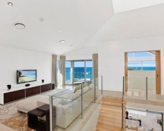Embracing a coveted absolute beachfront position this architect designed tri-level residence offers a rare opportunity for exclusive family living with an uninterrupted ocean backdrop. It provides an outstanding lifestyle just 10 minutes’ drive to Terrigal.
Six year old home with suspended slab concrete construction
Designed to capture spectacular views from every angle
Sophisticated setting with premium finishes and fixtures
Sleek neutral décor ensures the view remains centre stage
Open plan living and dining areas flow to beach view decks
Palatial master with vaulted ceiling and full spa ensuite
Underfloor heating, travertine tiles, CBUS wiring, in-ceiling speakers
Lower level kitchen creates potential guest accommodation
Exclusive address with expansive level lawn flowing to beach