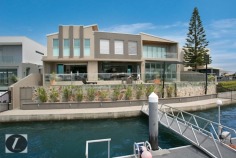 Modern contemporary elegance would best describe this stunning three-level home, perfectly positioned on the waterfront overlooking the wide open canal and out to the Broadwater. From the striking water feature in the entry, through to the incredible kitchen with backlit glass feature, this home provides the very best in indoor and outdoor luxury lifestyle. Whether you are after an impressive bar and entertaining area on the waterfront, or a huge man cave including 12 person spa, this is the house for you!

This home's features include:

-	6 bedrooms
-	5 bathrooms
-	3 powder rooms
-	10 car basement garage
-	North-to-water aspect
-	28 m* waterfrontage
-	Great floor plan with void creating abundance of light and space
-	Stone, marble and water features provide a warm ambience
-	Floor to ceiling glass bi-folds create the ultimate in seamless indoor/outdoor living
-	Sunken formal lounge with gas fireplace
-	Floor to ceiling glass creates spectacular frame for the sensational water views
-	Open plan living areas taking full advantage of the views
-	Fabulous kitchen with backlit glass feature, stone bench tops, wine fridge, Miele appliances including coffee machine
-	Stunning outdoor entertaining area with electronic shutters, stone benches, bar area, cold room, wine fridges, sink and BBQ - and a big screen TV!
-	Another open air entertaining terrace on the waterfront, next to the in ground heated lap pool with plunge pool
-	Tiered theatre with premier home theatre system, a bar and its own powder room
-	Impressive master suite on ground floor with stone feature wall above the vanities, enormous stand-alone bath
-	Master also boasts large walk-in robe with shoe and handbag display areas
-	Upstairs the 2 large waterfront bedrooms are ensuited with superb views
-	There are also 3 bedrooms built especially for the kids with built-in daybeds, which share a bathroom
-	Enviable 'man-cave' in basement, with sliding doors, plenty of room to create the perfect den for your needs
-	Just outside the den area is a 12-person spa
-	Also in basement you will find a dedicated gym room with TV and floor-to-ceiling mirrors, beauty room and bathroom
-	Schindler's lift to all levels
-	Polished timber floors upstairs
-	Floating pontoon with 15m* pontoon
-	Superb position in canal with views out to the open Broadwater
-	Fully fenced with secure gatehouse at front
-	Fully automated C-bus system
-	Reverse cycle ducted air conditioning

Located in a quiet cul-de-sac in a prestigious street surrounded by other waterfront mansions, you are in good company! The Sovereign Islands is a unique island community providing 24 hour security with patrols. Private, luxurious and secure, yet so close the cafes, restaurants, shops and parklands of Paradise Point.

Call Shaun today to arrange your private inspection.