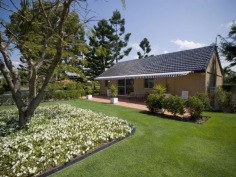 This prestigious estate is situated at the end of the highly respected Maryland Avenue. Situated in privacy behind grand electric gates and sand stone walls are two prime acres on two titles.

The architect has designed this home to maximize its North facing position with views to the East as well. This park like setting with mature trees is elevated 1.7 meters above adjoining land and has not been affected by major floods. This recently refurbished residence offers 1,000 square meters of opulent decor with the latest sinks, tubs and tap ware. Separate from the main house and situated near the entry gates is 2 bedroom guest house with its own complete kitchen, laundry, lounge and study. A large pontoon and wharf beside the river gives access to the Broadwater and out to the ocean from your back yard.

Features of this property:

7 Bedrooms, 6 bathrooms, 5 car garage with parking for upto 10 vehicles
Master bedroom includes parents retreat, twin dressing room, riverside balcony, and deluxe ensuite
Designer chefs kitchen with granite bench tops, 2 oven plus warming ovens, and walk in pantry
A Helipad has been approved for this estate.
Championship tennis court with flood lights and pavilion with kitchen, bath and shower.
10 meter pontoon, jet ski cradle, power and water supply
Infar-red security cameras with back to base alarms
Automatic emergency power generator
fully automated irrigation
Future sub- division potential - subject to council approval
Formal living area with open fireplace
Wine cellar
indoor/outdoor entertaining
In-ground swimming pool
in home theatre with elevated seating and soundproof walls
Games room
sizable laundry
Ducted air-conditioning
Landscaped gardens with mature trees and lush lawns, Horses are permitted on the property
Sweeping 200 degree river and skyline views
Less than 5 minutes drive to Royal Pines Golf Resort, Emerald lakes golf, Lakelands golf
8 min drive to Major Shopping Centres, Schools and Central Business district
This property is currently on two titles with an option to purchase the main house and guest house on 1 acre, or purchase 1 acre of riverfront land for offers over $2 million