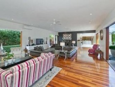 CURRENT OWNERS ARE DOWNSIZING
Don't miss out.........take this opportunity to purchase this spectacular family home with space for whole family! The current owners are downsizing, put your best foot forward and inspect now!

Situated on 1067m2, this magnificent family home offers not only a highly sought after address, but a carefree and ultra-contemporary design, focusing on space, privacy and lifestyle. 

The massive open-plan kitchen, living and dining area is a masterpiece and maximises the home's natural, magnetism for light and breeze. Multiple sliding doors connect you to the outdoors and the clever 'U' shape design highlights the stunning entertaining area, sparkling swimming pool and immaculate landscaped gardens. 

The deluxe kitchen is fitted with the most-modern of appliances, including integrated miele dishwasher, stainless steel gas cook top, double AEG stainless steel ovens, huge walk in pantry and expansive stone island bench complete with striking chandeliers that set the mood for an intimate dinner or a bright and festive fare. 

Four of the five mammoth bedrooms have ensuites and all have walk in robes. The master suite having his and hers walk in robes and a spacious hotel style ensuite with stone bench tops, double sinks and spa. 

All five bedrooms are located upstairs, leaving the living and work spaces including a home office and personal gym with access to the swimming pool on the ground level away from the bedrooms.

Close to local shops, universities, transport and some of Brisbane's best schools. Walk to the Queensland Tennis Centre, parklands, bike paths and transport.

Features

- 1067m2 
- Prime location
- Flexible living options
- Huge 3 car lock up garage with storage
- High ceilings
- Polished hard wood floors
- Fully air-conditioned
- Enormous bedrooms
- Media room/games room
- 3 separate living areas
- Built-in stainless steel outdoor kitchen
- Sauna
- Sparkling swimming pool
- Fully fenced private grounds with intercom
- Low maintenance landscaped gardens 
Property Details	
Price $2,195,000	Rates $661.40 per quarter
Total Area 1067 m2