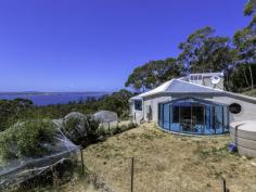 175 Tinderbox Road, Tinderbox TAS Stunning & Exclusive European Styled Haven Welcome to private, sublime and prestigious living. This home has a dazzling 180 degree water view which sets the scene for the majestic spit level, high ceilinged, open plan spectacular that is your new living space. Purposely built by the owner this property is of superior quality and truly a marvel that needs to be inspected to be fully appreciated. Sitting on 5 acres this 330m2 approx (including garage) home offer a plethora of benefits and extras but let's start with the basics. The open plan kitchen is a work of art with skilfully hand crafted timber fixtures and high quality appliances, with a back drop of stunning water views it is in fact an envious creative space to cook up a feast. Behold 4 beautifully styled bedrooms; the master suite (on top level) has exceptional water views, private balcony, ensuite with double shower, double vanity and full sized spa. In all there are 3 bathrooms in this gorgeous abode, 2 residing off the main living area as well as a study. Off the sizable dining area is a sun catching semicircle domed, fully glassed conservatory which leads to a fully fenced backyard.  This home also boasts floor heating which can be used in individual rooms or the whole area, you choose. Other features include a very large separate laundry/utility room, wine cellar (in the basement area), tiled double garage with internal access, additional multiple parking spots on concreted driveway and several various established fruit trees. In close proximity to schools, beaches, shopping conveniences and services. If you are exploring properties in this price range please do not miss the opportunity to inspect this exciting, luxurious and visually rich home. House Size: 300 sqm (approx) Land Size: 20730 sqm (Approx)   Property Snapshot   Property Type: House Construction: Brick Features: Ensuite 