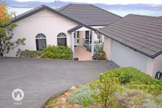 EXECUTIVE/FAMILY HOME WITH PANORAMIC HARBOUR VIEWS FOR SALE - $795,000+ It is indeed a treat to live in Hobart and be able to enjoy one of the most amazing views in the world. Every room in this executive home enjoys a spectacular outlook, which encompasses the City, Casino, harbour, iconic Tasman Bridge and Eastern Shore as far as Bruny Island. This really is something special. The sun streams through the windows making the home light, bright and (most importantly), warm. The benefit of the Northerly aspect is maximized with a deck (with automated "Vergola") extending from the main living room and master bedroom, together with a balcony extending along the front with sliding glass doors from the informal family room. The hub of most homes is usually the kitchen and here, there's a sparkling white kitchen with black granite benches for the family chef to enjoy. With plenty of storage and preparation space, and having informal meals and family areas adjoining, you'll always feel involved with family and friends as you prepare the next culinary delight. Ideal for a family, this home offers 5 bedroom accommodation. The master bedroom enjoys a walk-in robe and ensuite, together with access through glass doors to a deck. It would be hard to think of a day where you wouldn't wake up feeling on top of the world, when you have the panoramic views offered here to wake up to! With both formal and informal rooms together with decks for entertaining, one would think that everything had been taken care of, but wait, there's more! An indoor natural-gas heated pool and gymnasium offer year-round fun and fitness opportunities for your family and, if you feel like relaxing in front of a great movie, the media room is just the place for you to snuggle up with pop corn or an ice cream and escape for a while.  Built with ease of living and comfort in mind, other features of this home ducted reverse-cycle air conditioning, ducted vacuum system and intercom system throughout, together with underfloor heating in the main bathroom downstairs (together with 1 bedroom) and throughout the entire first floor. Outdoors is a small, low maintenance garden with a range of fruit trees and some beds awaiting you to grow your own vegetables. In close proximity of schools, UTas, shops and services and just 6-8 minutes from the city, this is an executive home of generous proportions and enjoying a spectacular harbour vista. We'd be delighted to show you through on a personal inspection, so please call Michael or Jill to schedule a suitable time. PROPERTY OVERVIEWProperty ID:3P1612Property Type:HouseLand Size:559m² approx.Building Size:341m²Garage:2Car Space:2Inspection Times:As Advertised or by Appointment 