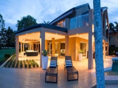 This prestigious estate is situated at the end of the highly respected Maryland Avenue. Situated in privacy behind grand electric gates and sand stone walls are two prime acres on two titles.

The architect has designed this home to maximize its North facing position with views to the East as well. This park like setting with mature trees is elevated 1.7 meters above adjoining land and has not been affected by major floods. This recently refurbished residence offers 1,000 square meters of opulent decor with the latest sinks, tubs and tap ware. Separate from the main house and situated near the entry gates is 2 bedroom guest house with its own complete kitchen, laundry, lounge and study. A large pontoon and wharf beside the river gives access to the Broadwater and out to the ocean from your back yard.

Features of this property:

7 Bedrooms, 6 bathrooms, 5 car garage with parking for upto 10 vehicles
Master bedroom includes parents retreat, twin dressing room, riverside balcony, and deluxe ensuite
Designer chefs kitchen with granite bench tops, 2 oven plus warming ovens, and walk in pantry
A Helipad has been approved for this estate.
Championship tennis court with flood lights and pavilion with kitchen, bath and shower.
10 meter pontoon, jet ski cradle, power and water supply
Infar-red security cameras with back to base alarms
Automatic emergency power generator
fully automated irrigation
Future sub- division potential - subject to council approval
Formal living area with open fireplace
Wine cellar
indoor/outdoor entertaining
In-ground swimming pool
in home theatre with elevated seating and soundproof walls
Games room
sizable laundry
Ducted air-conditioning
Landscaped gardens with mature trees and lush lawns, Horses are permitted on the property
Sweeping 200 degree river and skyline views
Less than 5 minutes drive to Royal Pines Golf Resort, Emerald lakes golf, Lakelands golf
8 min drive to Major Shopping Centres, Schools and Central Business district
This property is currently on two titles with an option to purchase the main house and guest house on 1 acre, or purchase 1 acre of riverfront land for offers over $2 million
