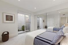 HAMPTON 28 Beach Road
EmailFacebookTwitterGoogle +Print this pageAdd to Favourite/BookmarkShare this site
Private Sale Contact Agent
4 B 3 b 4 C Watch property video
Unparalleled Resort Style Living on the Bay!
Enjoy a luxury beachside lifestyle with show-stopping bay views and timeless Jon Friedrich design with a focus on exceptional indoor/outdoor entertaining. Inspired by Noosa's Seahaven Resort this prestigious 3 bedroom, 3.5 bathroom residence boasts spectacular uninterrupted views stretching from Sandringham Yacht Club to Green point & beyond combined with sparkling internal pool views downstairs. Immaculately presented for family enjoyment featuring grand proportions and three flexible living zones including a ground floor kids haven or guest quarters with two double bedrooms both with mirrored robes & sleek granite vanity ensuites and a fully fitted study that provides a fourth bedroom option. Choose a dip in the Bay via direct access to one of Melbourne's best beaches or luxuriate by the tranquil indoor resort style lap pool encased in huge glass windows with sliding doors to a vast family lounge & bar on one side and a landscaped, paved outdoor area on the other. Panoramic views dominate the upstairs open plan living & dining area with an epicurean kitchen (granite bench tops & walk in pantry) and a sublime full-length outdoor terrace perfect for sunset entertaining. An elegant parents lounge with study alcove & a rear sun soaked deck (built in BBQ) precedes a lavish master suite with 'his & hers' dressing room and a grand Travertine spa ensuite. Meticulous attention to detail, superior finishes and luxury extras such as custom cabinetry throughout, a poolside shower, zoned heating/A/C, ducted vacuuming, alarm and a unique circular driveway with two internal access double garages (4 cars) only moments to Hampton Street shopping, dining & the station complete this idyllic family residence. For more information about this unsurpassed lifestyle property please contact Andrew Campbell.