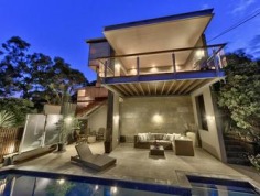 Distinctive Executive Design offering enviable lifestyle
Designed by Brisbane renowned architects Arkhefield, the residence rises from the street to a commanding position on 810m2 - a statement in engineered executive architecture and design. The angular vertical and horizontal planes, innovative utilization of glass sliders and bi-folds has created a residence that flows seamlessly inside to outside and from formal to informal living. Spanning three levels the home captures views overlooking Bardon to Brisbane city, as well as the gentle north-easterly breezes. Distinctive and unique, it is a residence that accommodates the growing family to perfection.

Entry
* Formal living and dining is elevated on a spotted gum timber floor and spills out onto the covered verandah perfect for entertaining
* Gourmet Galley style kitchen featuring Corian bench tops, sleek cabinetry and stainless steel appliances
* Open plan family living and dining flows out to a private patio 
* Three generous bedrooms, with built-in robes and ceiling fans
* Study that shares the patio
* Fitted laundry 
* Family bathroom and Powder room

Ascending the central suspended staircase
* Parents retreat with stylish ensuite featuring spa bath and twin basins
* Generous walk-in wardrobe
* Glorious views to the city and surrounds

Descending the central suspended staircase from the entry level
* Glorious undercover alfresco living overlooks the infinity edge in-ground pool and beyond
* Media /Rumpus room 
* 3rd bathroom
* Triple lock-up garage with generous storage space

Outstanding features
* Architectural innovation and style
* Combination of spotted timber floors, tiles and carpeted bedrooms
* Ceiling fans in bedrooms and ducted air-conditioning throughout
* Stylish attention to detail and finish

Positioned in a tightly held pocket amongst prestigious residences this home offers an enviable lifestyle that supports your executive needs. Located close to schools, parks and local shops with the Paddington and Rosalie cafe precinct, and City are on your doorstep.

For more information please call Andrew Degn 