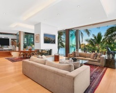 An exceptional and private landmark property of world class standing centrally located on the Gold Coast. Custom built architectural excellence to rival the best homes on planet earth, this iconic prestige riverfront estate on Adam’s Basin encompasses a perfect north east aspect on 2,197sqm land amid exotic gardens.
Exquisite north east aspect formal and casual living spaces
Selected timbers, hand cut sandstone and Travertine floors
Lanai entertaining area overlooks a sparkling pool and spa
Granite Euro equipped kitchen, butler’s pantry and cold room
King sized bedrooms with ensuites, main has a dressing room
Impressive rooms and private wings include a billiards den
Theatre, study, gym, Lanai bar and BBQ kitchen; maid’s quarters
Temperature controlled vast wine cellar; sauna and heated spa
Lift, Lutron wiring, CCTV and basement parking for six cars