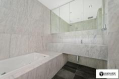 Unit 1501/507 Wattle Street,  Sydney NSW For Sale - $3,300,000  3  4  4 For the first time offered since completion, Vanguarde is happy to present to you this spectacular brand new three bedroom penthouse, which is ideal for the modern family or foreign purchaser. Commanding the top 2 levels, this impressive residence offers a huge roof top terrace with uninterrupted 180 degree north, views of Sydney. Spanning from the west right around to the east, this aspect incorporates stunning city skyline and Anzac Bridge views. Accommodation comprises of 3 generous bedrooms, all with full ensuites including spa bath, and built in robes. This residence offers a total of 545sqm on title. The huge rooftop terrace includes a full outdoor kitchen with BBQ plus a complete guest bathroom. With direct lift access from the ground, making it perfect for entertaining guests! Features include only the highest quality finishes throughout, including marble stone and Australian hardwood timber flooring, LED lights and double glazed floor to ceiling glass, allowing you to take in the expansive views. The designer kitchen comes complete with White Caesar stone bench tops, stainless steel Smeg appliances including built in coffee machine and plate warmer, soft close drawers and a built in double door fridge. The residence provides ducted reverse cycle air-conditioning, spacious 4 car lock up garage with direct lift access plus extra storage, an internal laundry and a self controlled video security system.  With the lowest strata levies in Sydney for a property of this size, and the possibility to extend space and add value, the opportunities in purchasing this property are endless.  This is truly a unique property and is must see for anyone looking at purchasing their perfect city home! Quarterly Rates Strata: $805 per quarter approx Water: $168 per quarter approx Council: $225 per quarter approx For more information contact Travis Reeve on 0414 347 713 or travis@vanguarde.com.au or Darren Smith on 0412 418 415 