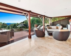 ‘Villa Gabrielle’ graces an address reserved for a privileged few with three architect designed levels embracing sweeping ocean views to Mount Warning. This property has a series of customised living and entertaining spaces and is footsteps to the beach.
Glass doors open to reveal the best views in Byron Bay
Double height foyer has an aquarium and Italian marble floor
Split level dining area and Miele equipped designer kitchen
Lounge features blackbutt floors with a red mahogany border
Tropical gardens reveal a stone water cascade and log gazebo
Black tiled 12m swimming pool with a Japanese stone wall
Double bedrooms pair with deluxe, bespoke feature bathrooms
Master enjoys a level of luxury and a sea view bath ensuite
Vast 734sqm block with lane access and stairs to beach
Near conservation area and minutes to the heart of Byron Bay