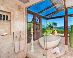 ‘Villa Gabrielle’ graces an address reserved for a privileged few with three architect designed levels embracing sweeping ocean views to Mount Warning. This property has a series of customised living and entertaining spaces and is footsteps to the beach.
Glass doors open to reveal the best views in Byron Bay
Double height foyer has an aquarium and Italian marble floor
Split level dining area and Miele equipped designer kitchen
Lounge features blackbutt floors with a red mahogany border
Tropical gardens reveal a stone water cascade and log gazebo
Black tiled 12m swimming pool with a Japanese stone wall
Double bedrooms pair with deluxe, bespoke feature bathrooms
Master enjoys a level of luxury and a sea view bath ensuite
Vast 734sqm block with lane access and stairs to beach
Near conservation area and minutes to the heart of Byron Bay
