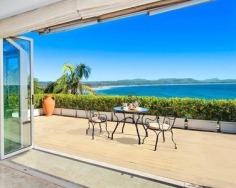 ‘Villa Gabrielle’ graces an address reserved for a privileged few with three architect designed levels embracing sweeping ocean views to Mount Warning. This property has a series of customised living and entertaining spaces and is footsteps to the beach.
Glass doors open to reveal the best views in Byron Bay
Double height foyer has an aquarium and Italian marble floor
Split level dining area and Miele equipped designer kitchen
Lounge features blackbutt floors with a red mahogany border
Tropical gardens reveal a stone water cascade and log gazebo
Black tiled 12m swimming pool with a Japanese stone wall
Double bedrooms pair with deluxe, bespoke feature bathrooms
Master enjoys a level of luxury and a sea view bath ensuite
Vast 734sqm block with lane access and stairs to beach
Near conservation area and minutes to the heart of Byron Bay