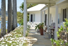 Bimbadeen means place of waterbirds - a waterfront acres sanctuary with 300 degree lake views, fishing, boating, sailing, flying??? Frontage to beautiful Lake Macdonald overlooking Noosa's botanical gardens. Private driveway is boarded by water on either side, with exotic wildlife and magnificent views to Mt Cooroy & Tinbeerwah. The perfect combination of being only 5 minutes from Cooroy and 15 minutes to Noosa, with town water, sewer and peace and tranquility. Sprawling brick residence with raked ceilings, french oak floors, gourmet kitchen, gas & induction cooking and ducted air conditioning. Solid timber doors & windows throughout. 3 separate living areas, wide entertaining patios, 4 car garage and boat store/cellar under the home.
500m Bitumen airstrip, fully insulated 2 plane hangar with workshop, separate machinery shed and van port.
Stroll the park like acreage on this resort style sanctuary tailored for relaxation. Host a tennis party on your own flood lit tennis court. This property is your opportunity to live the dream, own or operate an aircraft, also ideal for car or boat enthusiast with 2 large quality sheds and 3 phase power.18.29 acres/7.4 hectares. For further details or inspection please contact our office. rh06506

Bimbadeen - 18.29 acressealed airstrip2km Lake Frontplane hangar and shedstotally private