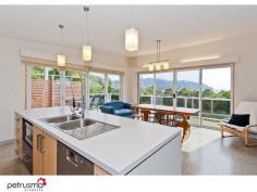 2 Caribbean Court, Eaglehawk Neck TAS Immediately striking from the street frontage, and enjoying the simply intoxicating views over Pirates Bay, this stylish residence is a step above in every respect. Thoughtful design, sleek interiors and true function.  Wonderfully located in this picturesque setting, this inviting property would suit full time residents or purchasers requiring an upmarket beach house to escape and enjoy all this brilliant area has to offer, being so close the local attractions and pristine beaches for which this area is renowned. Surrounded by easily maintained landscaped gardens, the lower level comprises two double bedrooms, additional living space and up to the minute modern bathroom.  Upstairs, striking polished concrete floors, extensive of glass and generous proportions have created a breathtaking living space maximising the views and allowing access the full length terrace, plus incorporating a beautiful kitchen with top quality fittings. The master suite is a feature in itself with enormous concealed walk through wardrobe and luxurious ensuite bathroom. Vehicle access is either at the front into the garage, or at the rear for backyard access and the double boat / carport. Beautiful finishes, neutral colour pallette and a simply wonderful setting culminate to create a very special property indeed.  - Generous light filled living areas  - A simply picturesque location  - Built and finished with true detail  - Living opening to terrace  - A residence of style and panache 