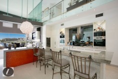 Modern contemporary elegance would best describe this stunning three-level home, perfectly positioned on the waterfront overlooking the wide open canal and out to the Broadwater. From the striking water feature in the entry, through to the incredible kitchen with backlit glass feature, this home provides the very best in indoor and outdoor luxury lifestyle. Whether you are after an impressive bar and entertaining area on the waterfront, or a huge man cave including 12 person spa, this is the house for you!

This home's features include:

-	6 bedrooms
-	5 bathrooms
-	3 powder rooms
-	10 car basement garage
-	North-to-water aspect
-	28 m* waterfrontage
-	Great floor plan with void creating abundance of light and space
-	Stone, marble and water features provide a warm ambience
-	Floor to ceiling glass bi-folds create the ultimate in seamless indoor/outdoor living
-	Sunken formal lounge with gas fireplace
-	Floor to ceiling glass creates spectacular frame for the sensational water views
-	Open plan living areas taking full advantage of the views
-	Fabulous kitchen with backlit glass feature, stone bench tops, wine fridge, Miele appliances including coffee machine
-	Stunning outdoor entertaining area with electronic shutters, stone benches, bar area, cold room, wine fridges, sink and BBQ - and a big screen TV!
-	Another open air entertaining terrace on the waterfront, next to the in ground heated lap pool with plunge pool
-	Tiered theatre with premier home theatre system, a bar and its own powder room
-	Impressive master suite on ground floor with stone feature wall above the vanities, enormous stand-alone bath
-	Master also boasts large walk-in robe with shoe and handbag display areas
-	Upstairs the 2 large waterfront bedrooms are ensuited with superb views
-	There are also 3 bedrooms built especially for the kids with built-in daybeds, which share a bathroom
-	Enviable 'man-cave' in basement, with sliding doors, plenty of room to create the perfect den for your needs
-	Just outside the den area is a 12-person spa
-	Also in basement you will find a dedicated gym room with TV and floor-to-ceiling mirrors, beauty room and bathroom
-	Schindler's lift to all levels
-	Polished timber floors upstairs
-	Floating pontoon with 15m* pontoon
-	Superb position in canal with views out to the open Broadwater
-	Fully fenced with secure gatehouse at front
-	Fully automated C-bus system
-	Reverse cycle ducted air conditioning

Located in a quiet cul-de-sac in a prestigious street surrounded by other waterfront mansions, you are in good company! The Sovereign Islands is a unique island community providing 24 hour security with patrols. Private, luxurious and secure, yet so close the cafes, restaurants, shops and parklands of Paradise Point.

Call Shaun today to arrange your private inspection.