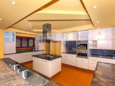 1264m2 Waterfront Position - Massive 800m2 Home with Heated Pool.
This architecturally designed family home & must be seen to be believed. If you are looking for space & privacy for even the largest of families - Don't miss out on this one.

Concrete suspended slab construction, with soaring 23ft ceilings

Private elevator, kids retreat, Media room, Teenagers area, plus home office for parents plus separate kids study as well.
Heated pool, huge storage, 3 car garage with workshop, Ducted Vacuum 
Fantastic outdoor entertaining, pontoon for fishing or water access to Tallebudgera Beach.

Located in a quiet friendly street, close to shops, schools and the airport.

INSPECTION IS A MUST!

The size, and options in this property are endless and you may wish to change the colour scheme - it's only paint ! The privacy and space is irreplaceable.

Look forward to showing you through.
 
Property Snapshot 

Property Type:HouseFeatures:Alarm Dishwasher Ensuite Formal Lounge In-Ground Pool