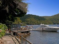 2 Anderson Place, Cottage Point NSW ottage Point Inn Restaurant & Apartments - Freehold For Sale Set in a location without comparison, is this famous waterfront restaurant/landmark - an institution amongst knowledgeable diners across Sydney and the world for over 30 years. This is an exceptional opportunity for an investor or entrepreneur to purchase one of the Hawkesbury's most exciting waterfront estates in a key location only 50 minutes from the CBD. The Cottage Point Inn Restaurant, set on the water at the junction of Cowan Waters and Coal & Candle Creek, was originally the Cottage Point boatshed and general store. The building was converted to a restaurant in the 1970s and has been operating since. Set directly behind the restaurant are two separate, fully self-contained apartments or cottages, which are included in the restaurant lease. Features include: - 5+5 year lease signed in 2012 by the tenant for restaurant and apartments - Income of $308,885.42 per annum (inclusive of GST) - Rent is indexed at CPI annually - Tenant pays 100% of outgoings (as defined in the lease agreement) - Tenant has over 30 years history of ownership and management of the restaurant and apartments - Improvements on the title include the Cottage Point Inn Restaurant building with substantial waterfront terraces, commercial kitchen, inside dining, air conditioning & his and her's bathroom - Substantial and wide waterfrontage - Floating deepwater pontoon for seaplanes and large boats - Office or flat above the restaurant with two rooms and bathroom - Two apartments set behind the restaurant - Both apartments have wide 180 degree views of magnificent Cowan Waters and Ku-ring-gai Chase National Park - Cottage one "Cowan Waters Apartment" is a self-contained apartment with full kitchen facilities, large dining and lounge area, private balcony, separate double bedroom, spa bath and reverse cycle air-conditioning - Cottage two "Riverview Suite" is equipped with breakfast bar, private balcony, lounge area, well-appointed bathroom & reverse cycle air-conditioning - License agreement (sub leased to the restaurant tenant) with National Parks and Wildlife services for the use of the land that sits over the high water mark - Access to the restaurant is by road, boat, ferry or seaplane   Property Snapshot   
