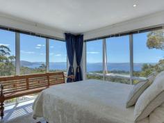 175 Tinderbox Road, Tinderbox TAS Stunning & Exclusive European Styled Haven Welcome to private, sublime and prestigious living. This home has a dazzling 180 degree water view which sets the scene for the majestic spit level, high ceilinged, open plan spectacular that is your new living space. Purposely built by the owner this property is of superior quality and truly a marvel that needs to be inspected to be fully appreciated. Sitting on 5 acres this 330m2 approx (including garage) home offer a plethora of benefits and extras but let's start with the basics. The open plan kitchen is a work of art with skilfully hand crafted timber fixtures and high quality appliances, with a back drop of stunning water views it is in fact an envious creative space to cook up a feast. Behold 4 beautifully styled bedrooms; the master suite (on top level) has exceptional water views, private balcony, ensuite with double shower, double vanity and full sized spa. In all there are 3 bathrooms in this gorgeous abode, 2 residing off the main living area as well as a study. Off the sizable dining area is a sun catching semicircle domed, fully glassed conservatory which leads to a fully fenced backyard.  This home also boasts floor heating which can be used in individual rooms or the whole area, you choose. Other features include a very large separate laundry/utility room, wine cellar (in the basement area), tiled double garage with internal access, additional multiple parking spots on concreted driveway and several various established fruit trees. In close proximity to schools, beaches, shopping conveniences and services. If you are exploring properties in this price range please do not miss the opportunity to inspect this exciting, luxurious and visually rich home. House Size: 300 sqm (approx) Land Size: 20730 sqm (Approx)   Property Snapshot   Property Type: House Construction: Brick Features: Ensuite 